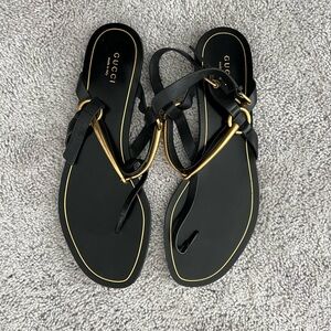 Gucci Women's Black and Gold Sandals